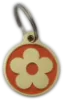 Custom-engraved Orange flower design dog tag with intricate detailing - UK Pet ID