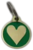Green Heart-shaped engraved dog tag with custom details on a UK dog collar